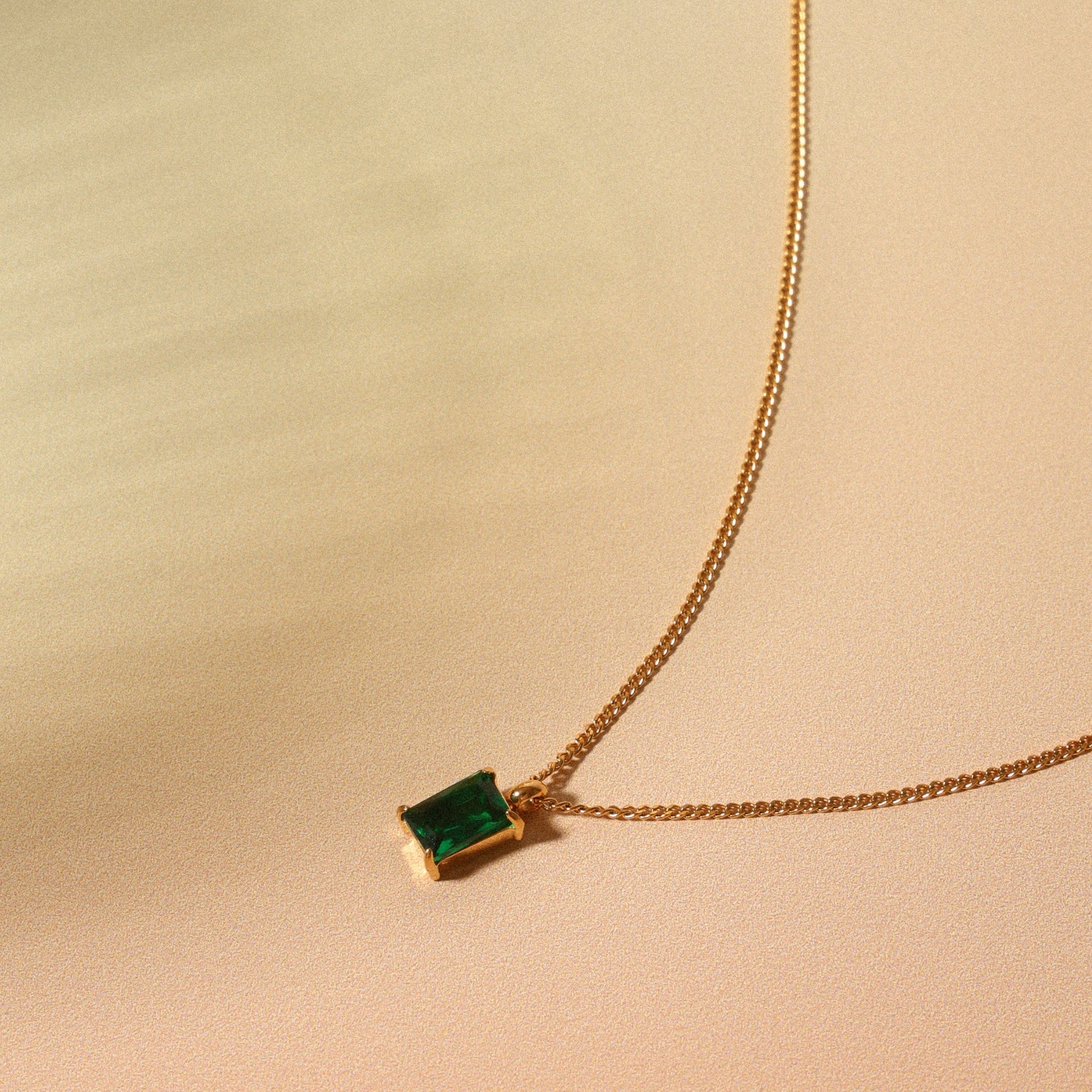Emerald Necklace In Warm Tone Background
