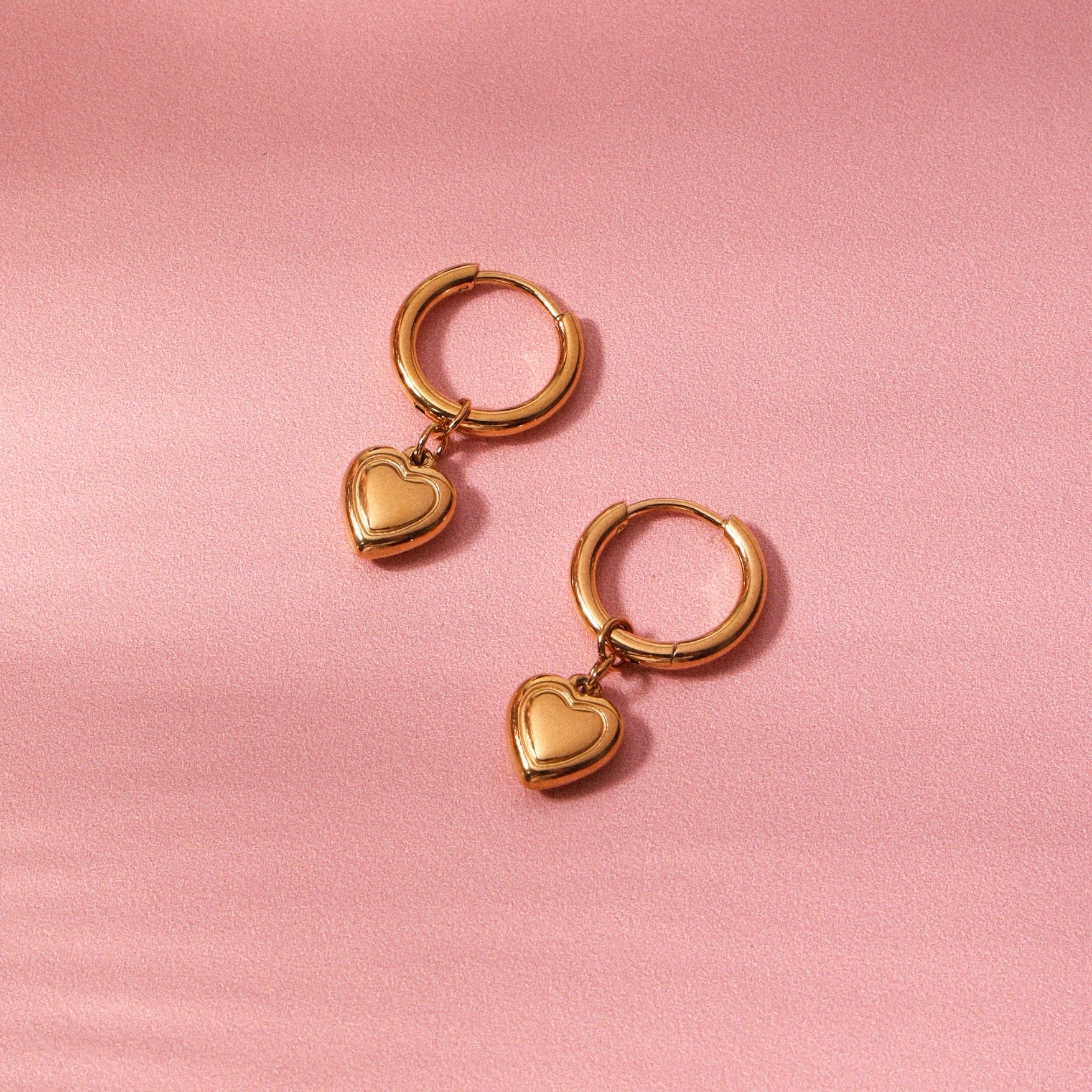 gold-heart-hoop-earrings-flat-lay