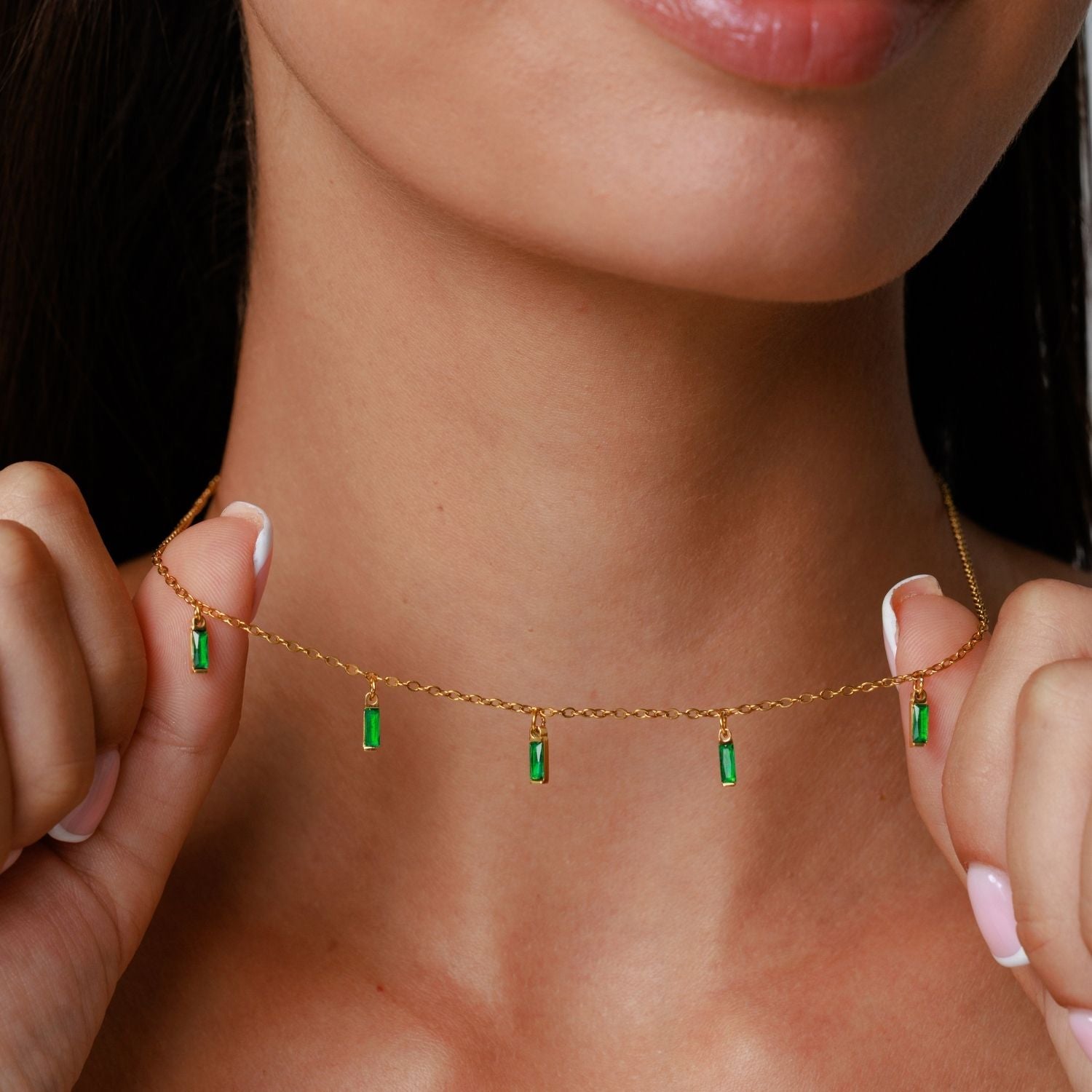 Rain Of Emeralds Choker Held In Hands