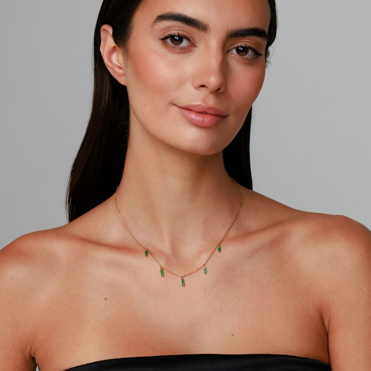 Woman Wearing Rain Of Emeralds Choker