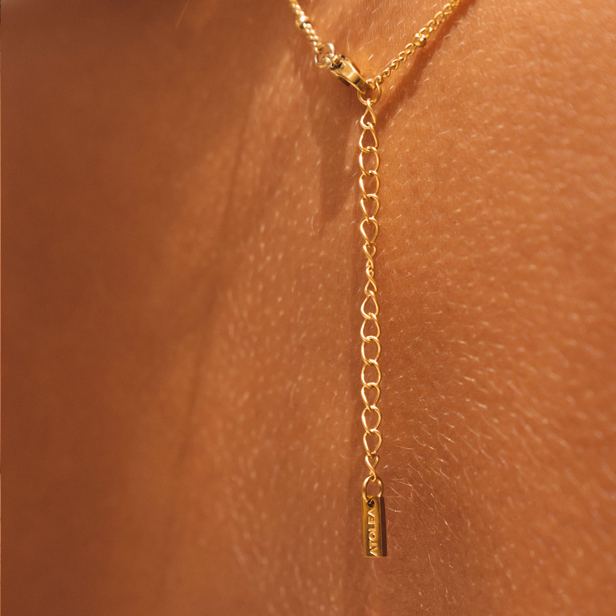 Santorini necklace clasp and adjustable extender chain worn on the neck