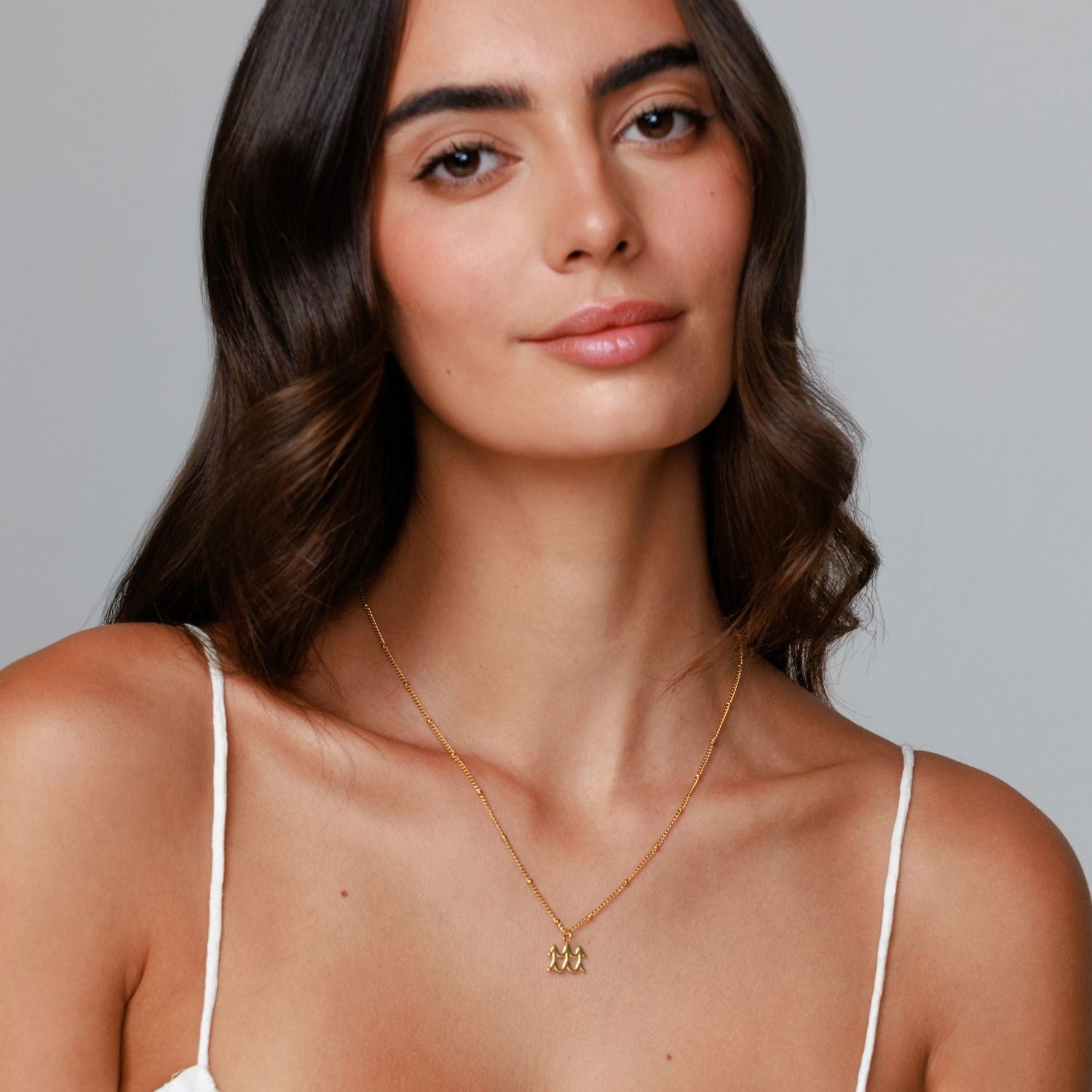 Woman Wearing Aquarius Necklace