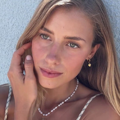 sun-pendant-gold-necklace-video-preview